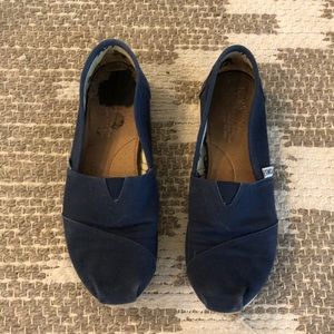 Navy TOMS canvas slip ons